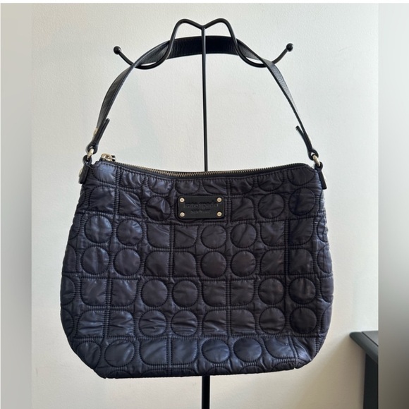 Kate Spade black nylon shoulder bag with circular quilted stitching and zip top - Picture 1 of 16